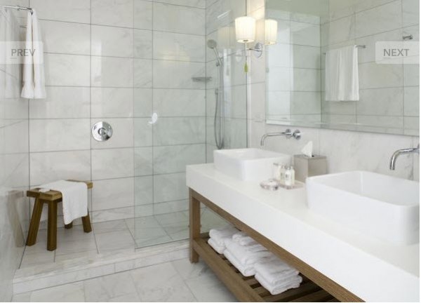 White Bathroom with Warm Wood Accents