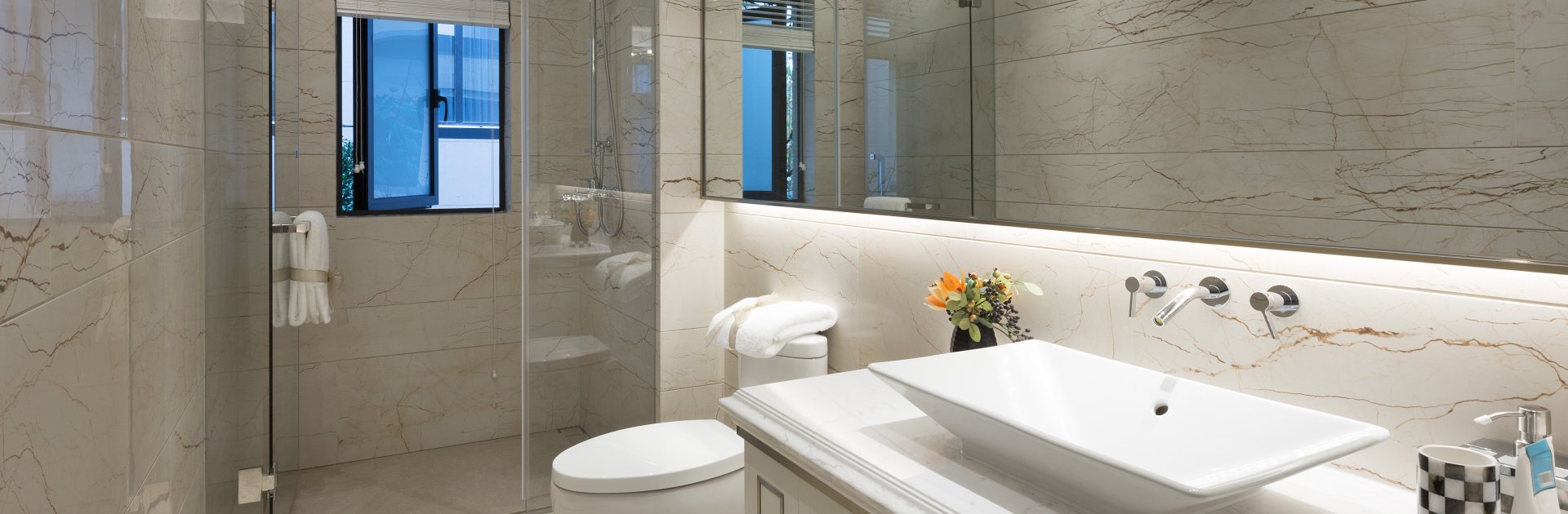Beautiful White Bathroom with Frameless Shower